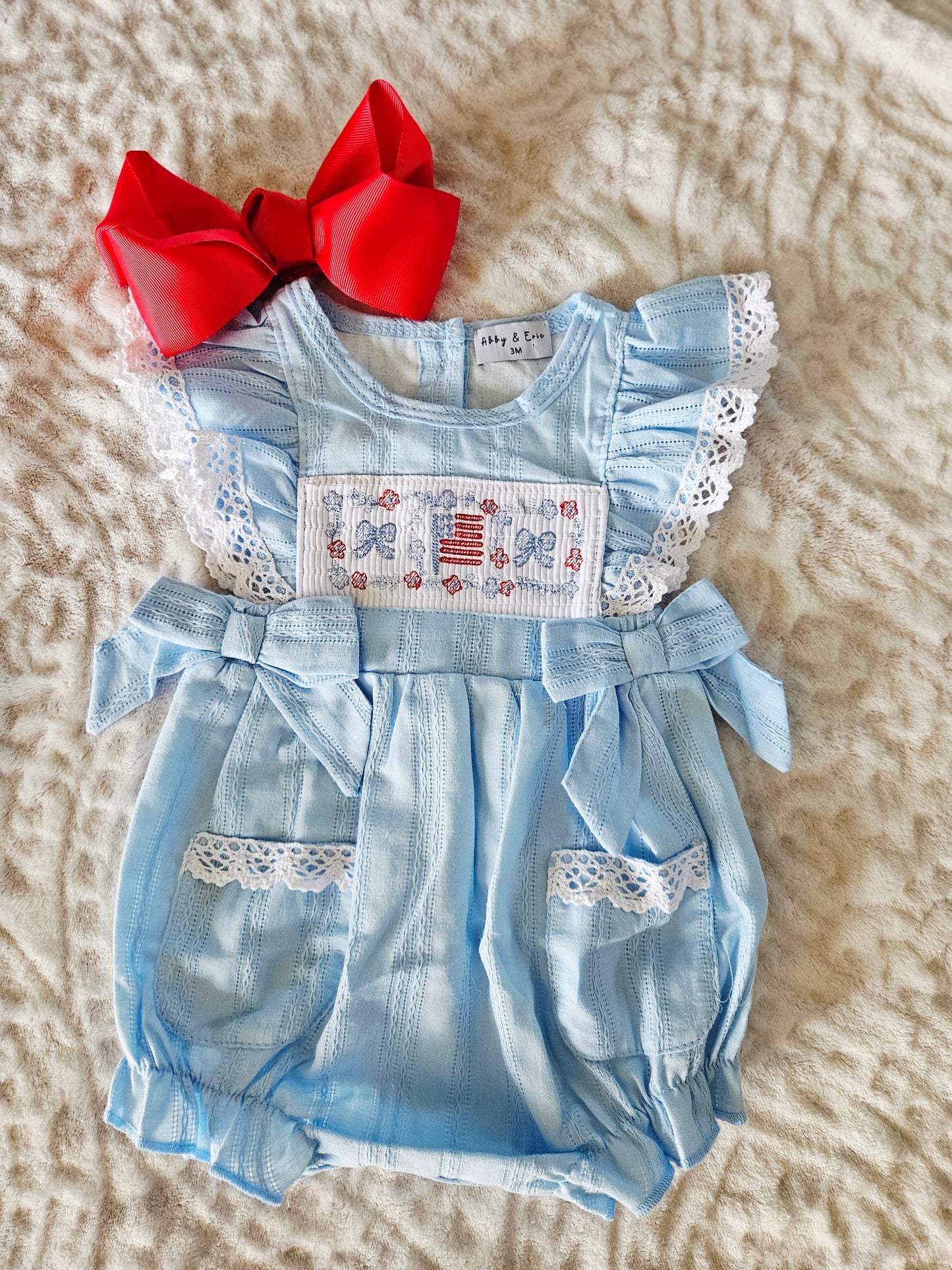 Blue flag smocked jacquard ruffle bubble